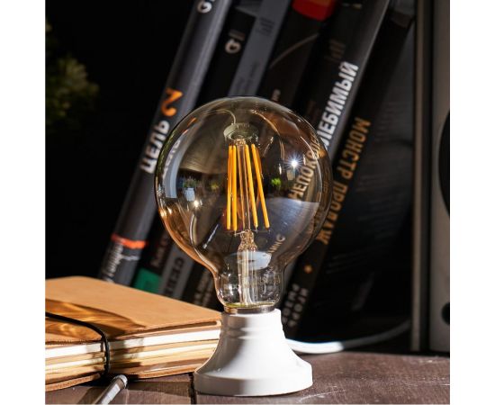 Филаментная лампа REXANT Груша A95 11.5 Вт 2400K E27 димируемая золотистая колба 604-143 – изображение 3